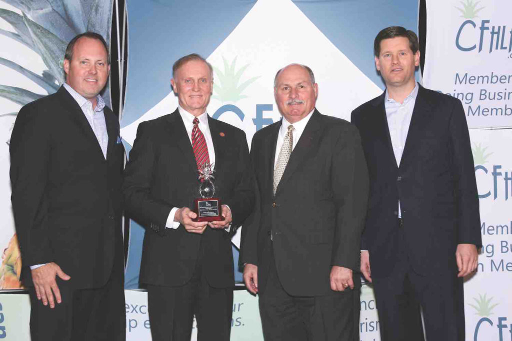 cfhlasimmons Central Florida Lifestyle Scott Tripoli General Manager of the DoubleTree by Hilton Orlando at SeaWorld Jeff Brinda of the Crowne Plaza Orlando Lake Buena Vista and Doug Gehret General Manager of the Hilton Orlando present Senator David Simmons with the 2013 Public Servant of the Year Award