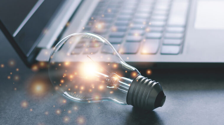 picture of a light bulb next to keyboard