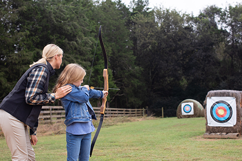 Barnsleyarchery Central Florida Lifestyle mom and daughter enjoying archery at Barnsley Resort