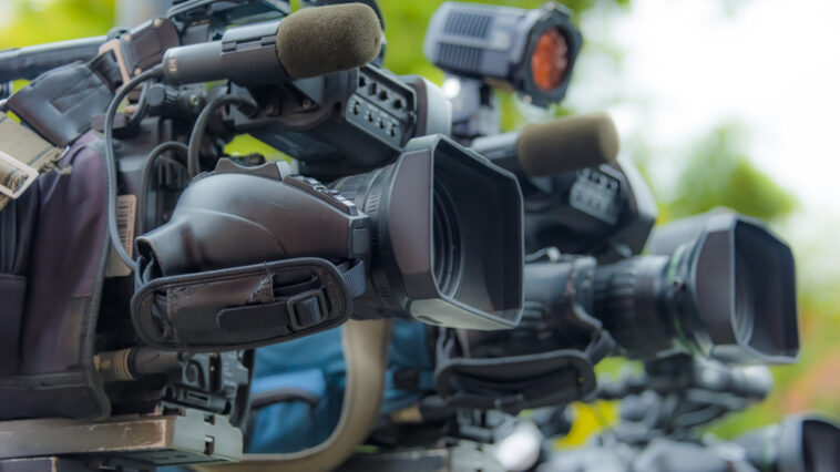 tv cameras on tripods to reflect reporting metrowest news