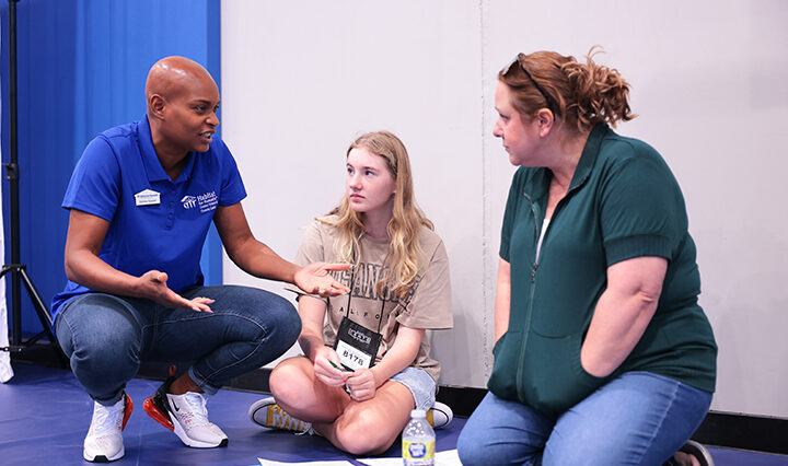 Youth receiving financial classes with Habitat for Humanity