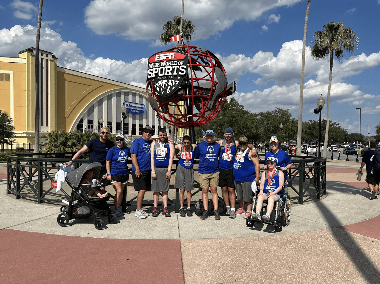 ScreenShot20230521at114620AM Central Florida Lifestyle Hillsborough County Track and Field Team in front of the ESPN Wide World of Sports globe at the Special Olympics